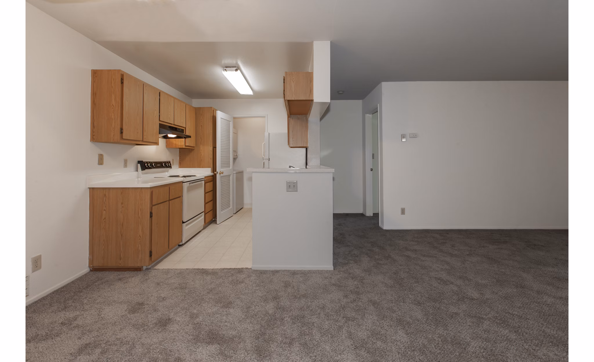Modern kitchen with stainless steel appliances at Monte Vista Apartments