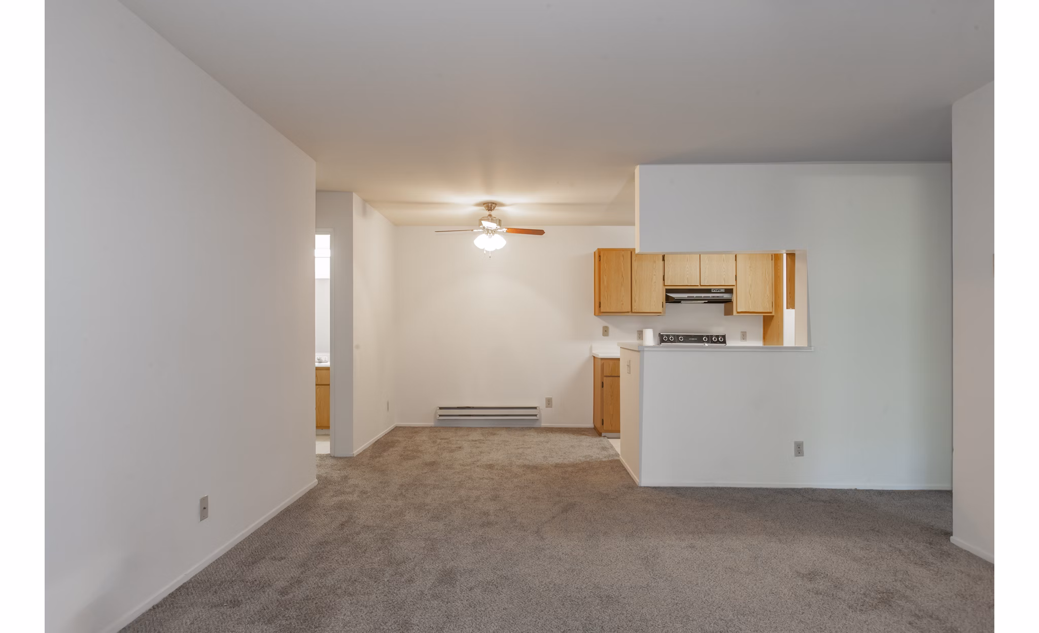 Spacious living room featuring stylish furnishings in Monte Vista Apartments