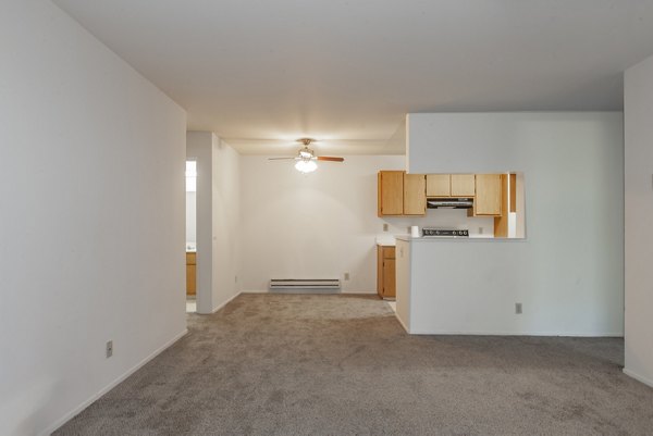 Spacious living room featuring stylish furnishings in Monte Vista Apartments