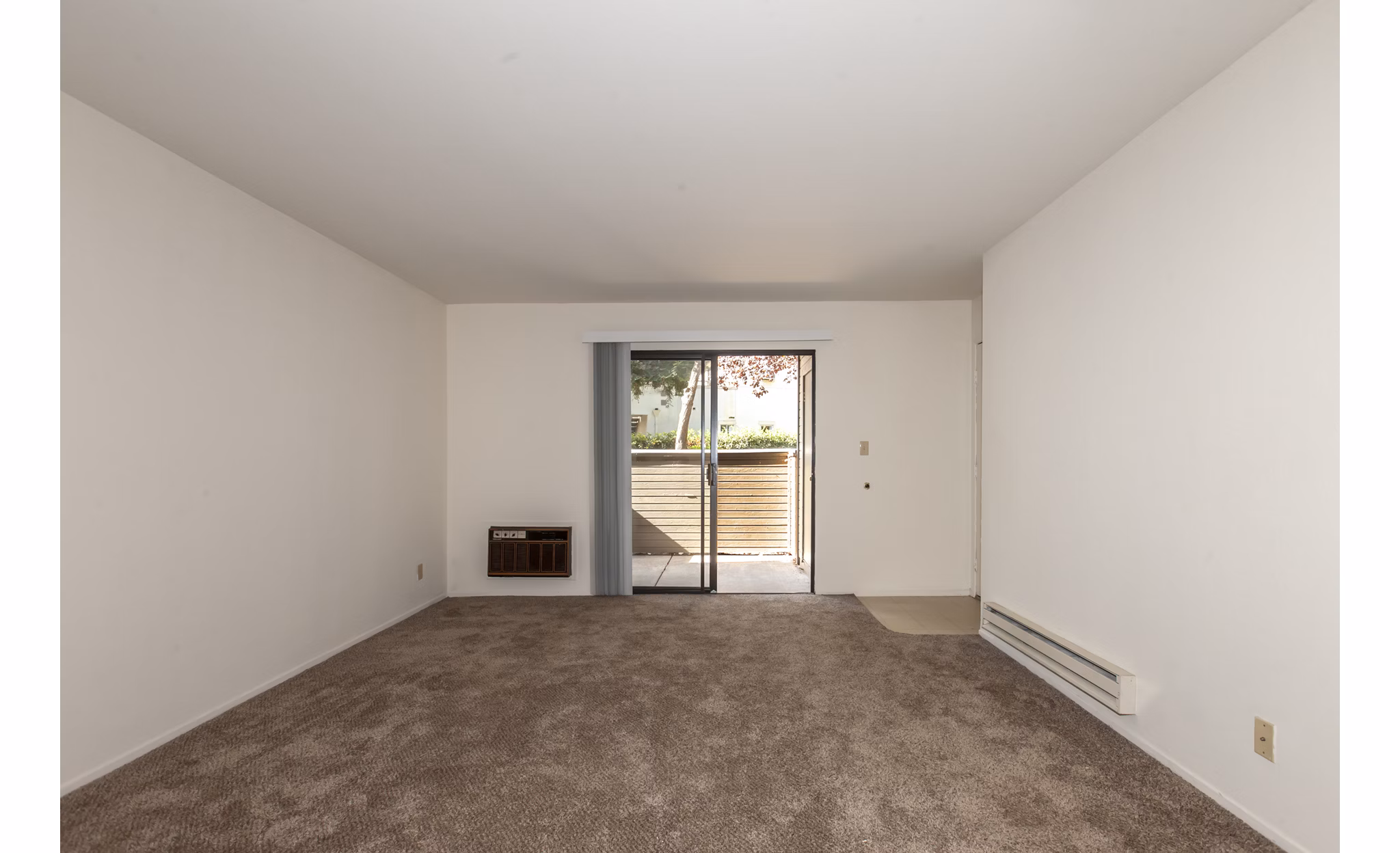 Spacious living room with modern decor at Monte Vista Apartments