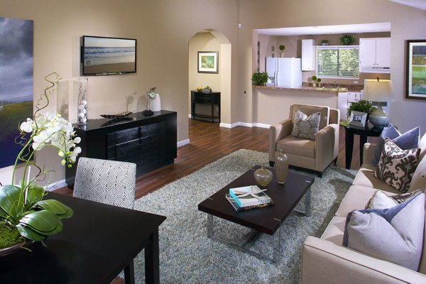 Modern clubhouse with stylish seating and fireplace at Brookside Apartments, a luxury Greystar community in scenic surroundings