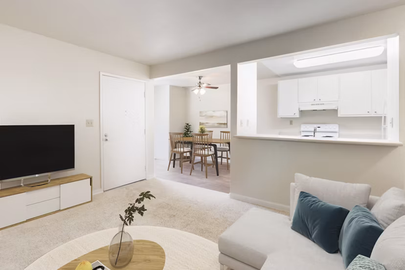 Dining area with modern furnishings and natural light at Brookside Apartments, luxury living by Greystar