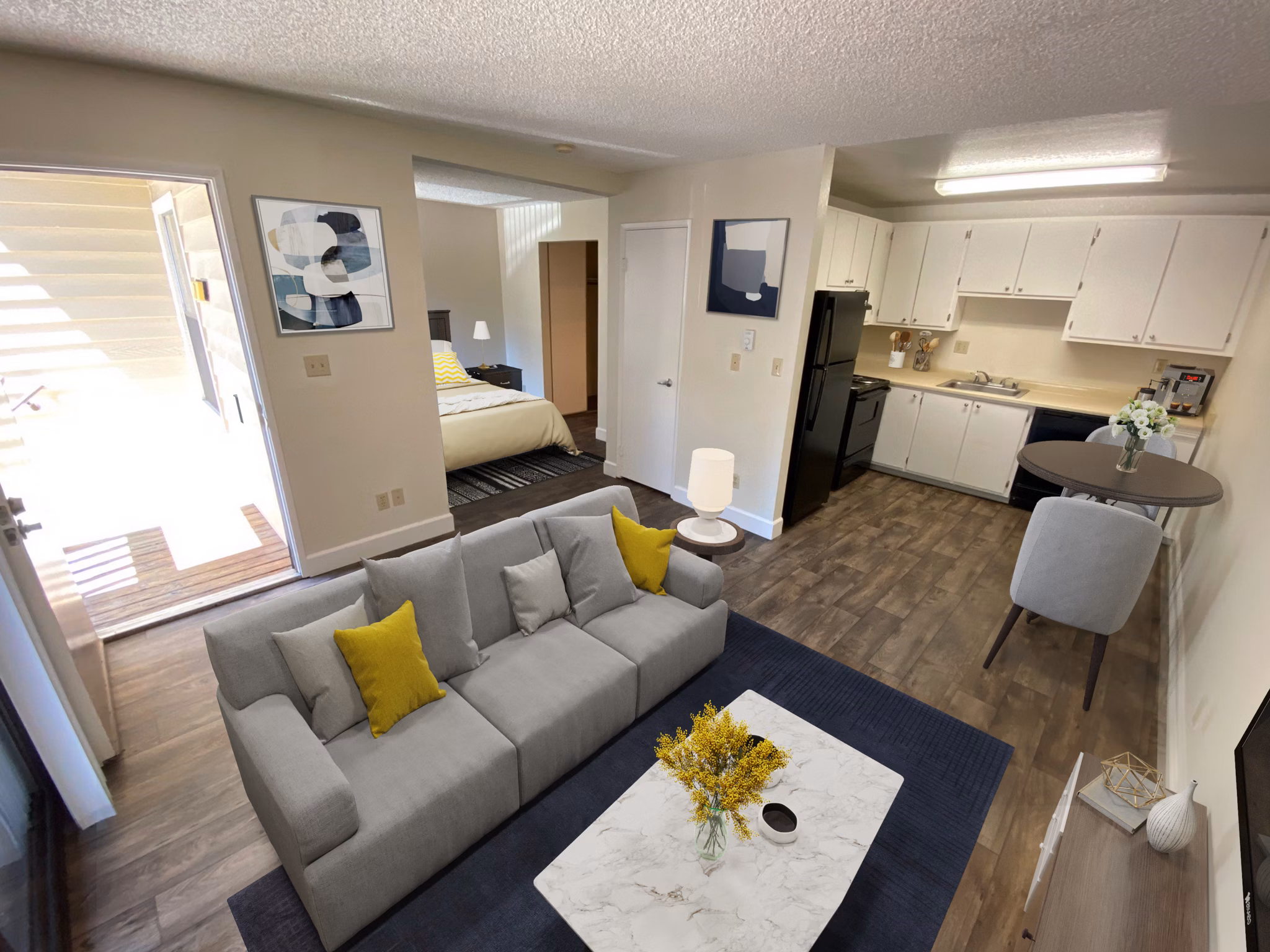 Elegant kitchen with stainless steel appliances in Brookside Apartments