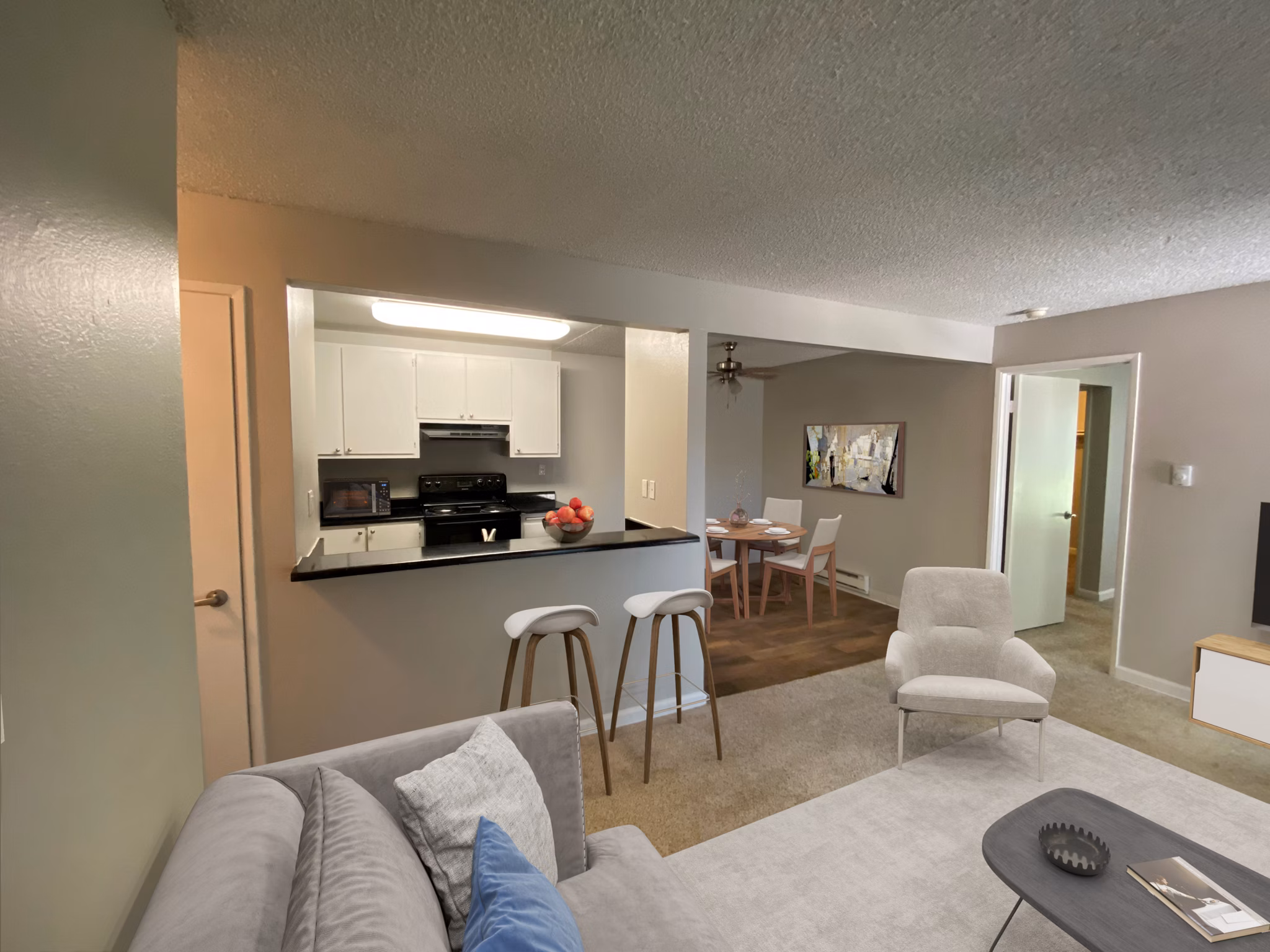 Brookside Apartments: Modern kitchen with stainless steel appliances and granite countertops
