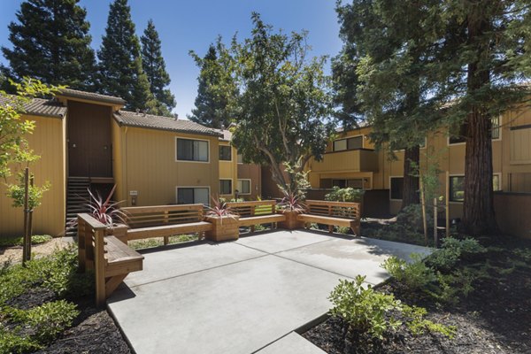 Recreational area featuring landscaped gardens at Mission Pines apartments