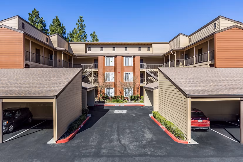 Covered parking facilities at Vista Oaks Apartments in Houston