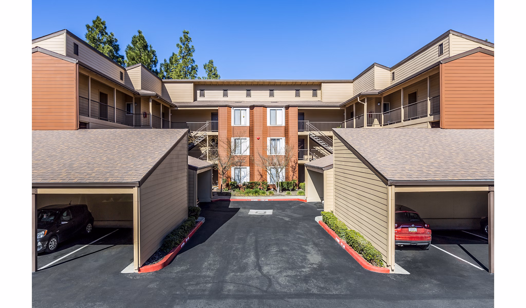 Covered parking facilities at Vista Oaks Apartments in Houston