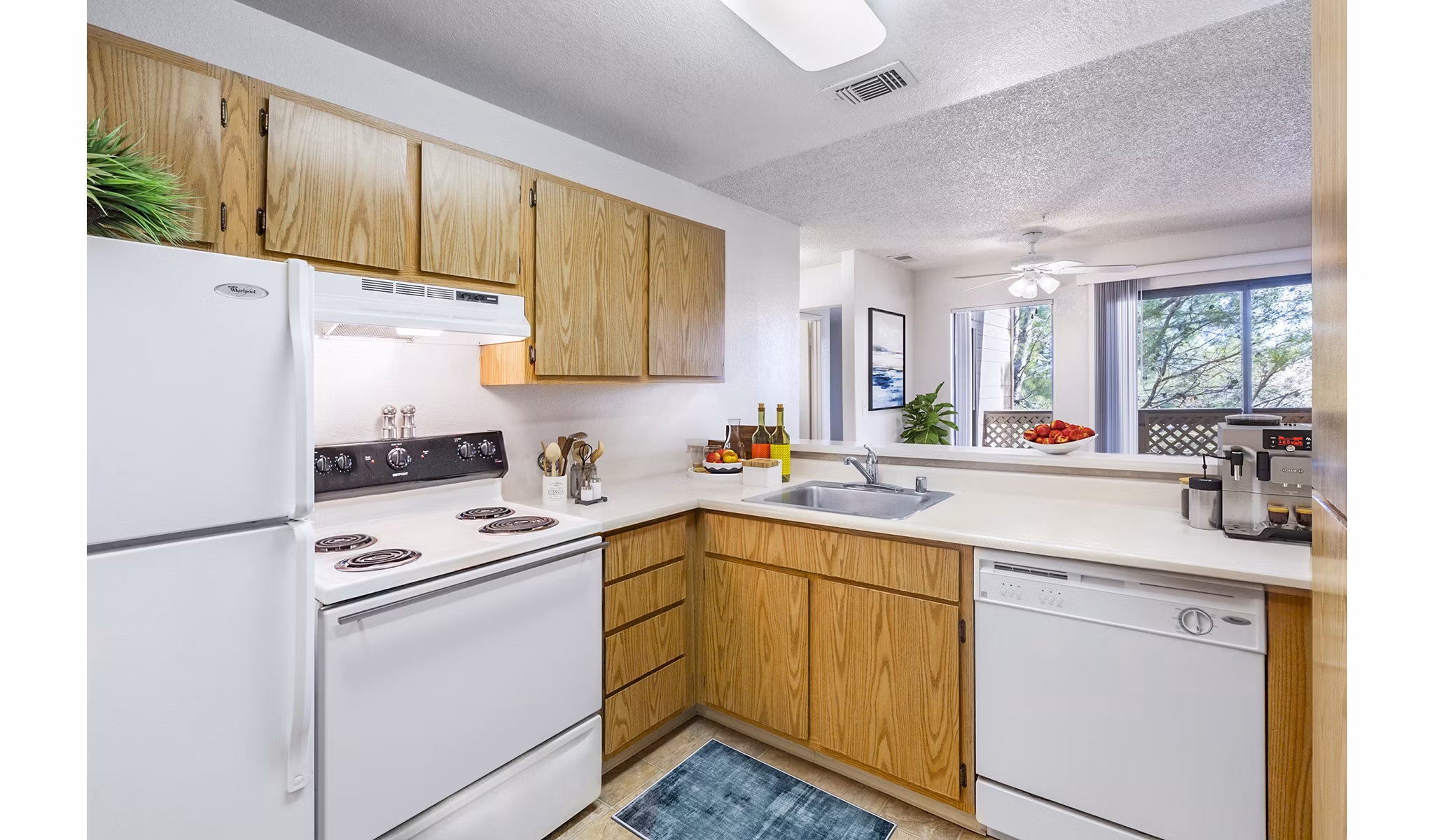 Kitchen with modern appliances and sleek cabinetry at Vista Oaks Apartments
