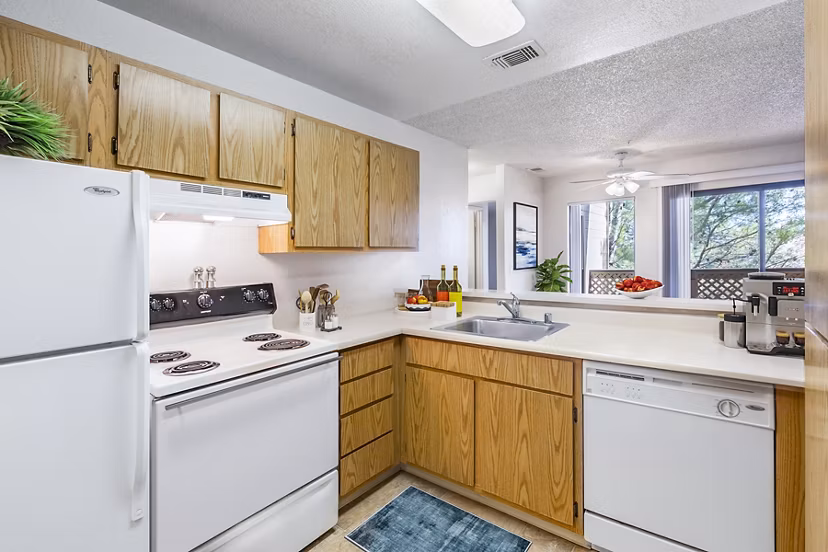 Kitchen with modern appliances and sleek cabinetry at Vista Oaks Apartments