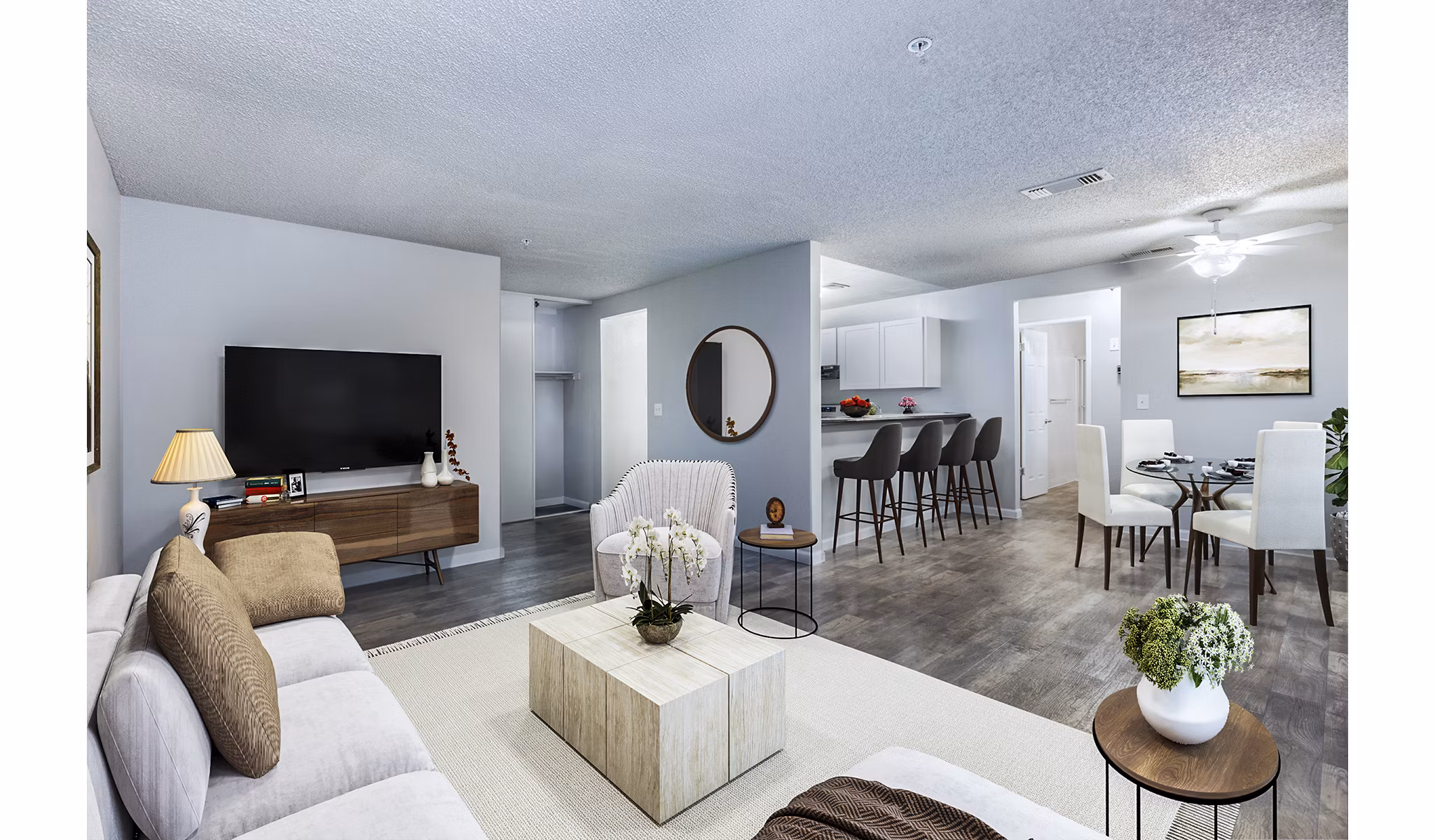 Cozy living room with modern decor and plush seating in Vista Oaks Apartments