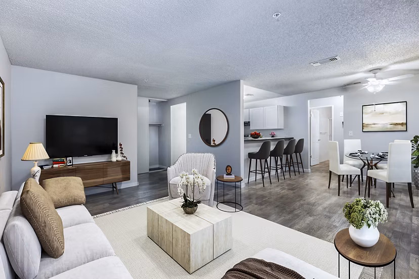 Cozy living room with modern decor and plush seating in Vista Oaks Apartments