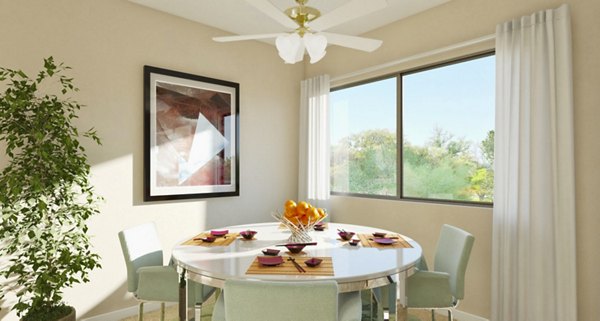 Dining area with modern furnishings and large windows at Lime Ridge Apartments, luxury living by Greystar