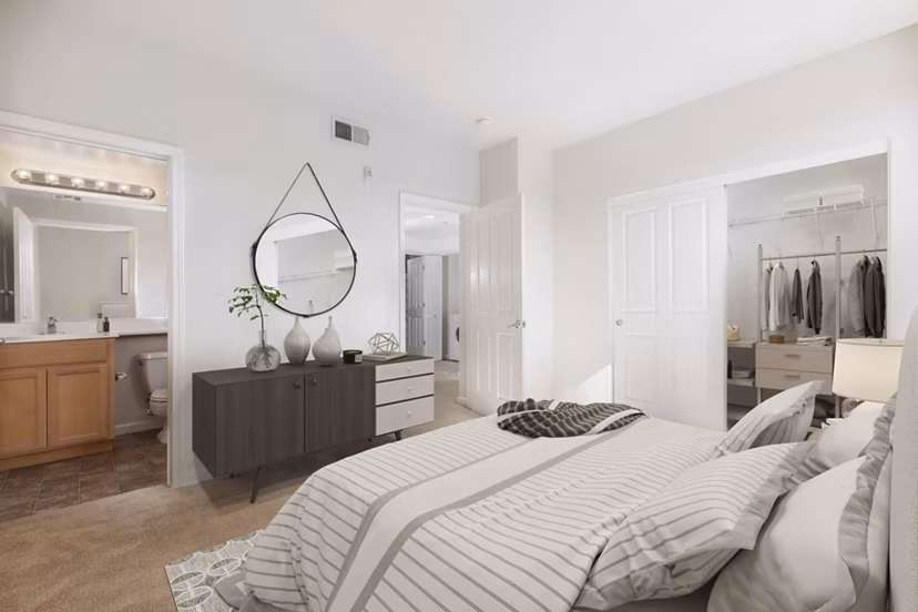 Spacious bedroom featuring elegant decor at the Villas at Monterosso luxury apartments
