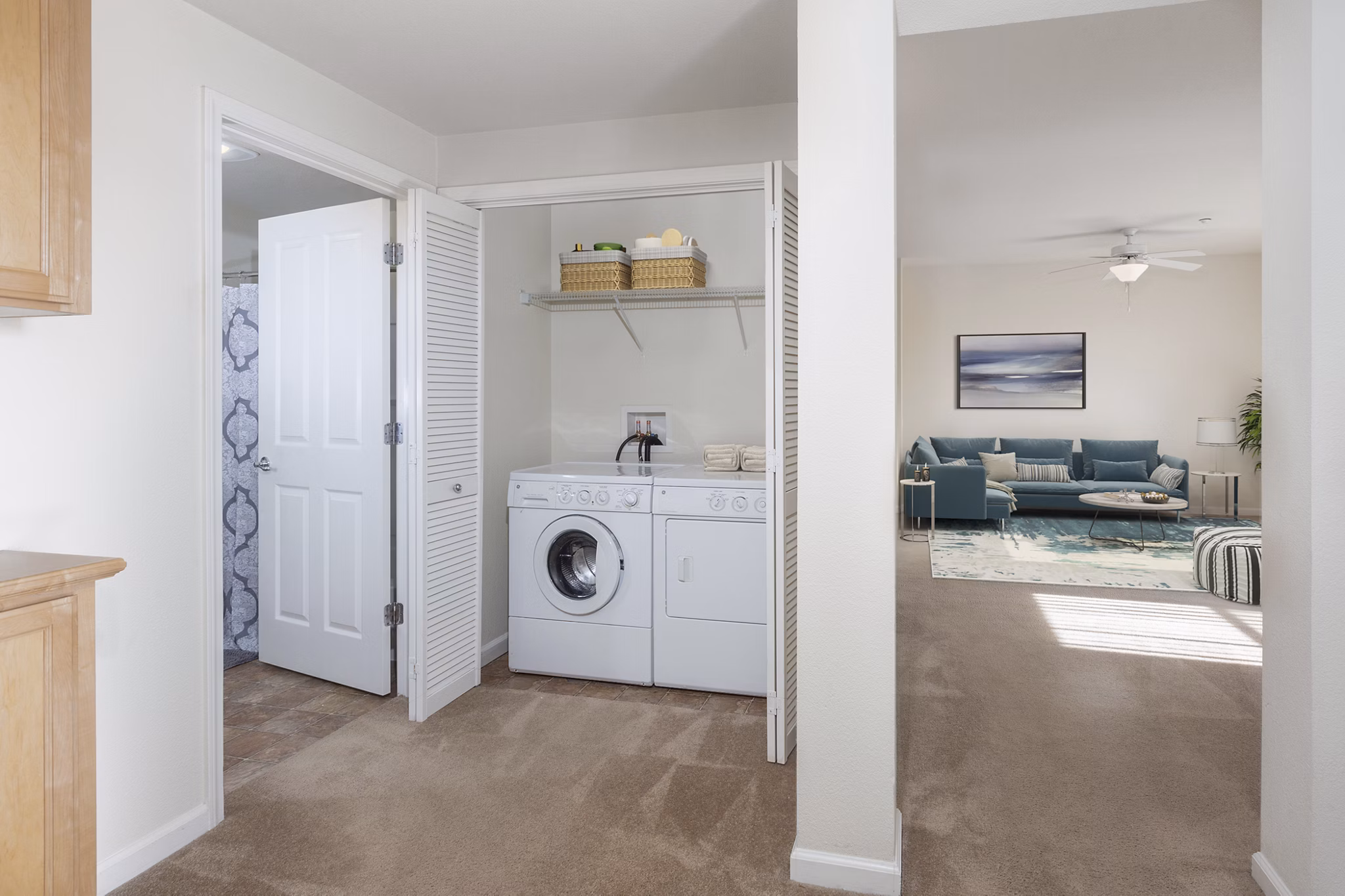 Laundry room with modern appliances at the Villas at Monterosso luxury apartments