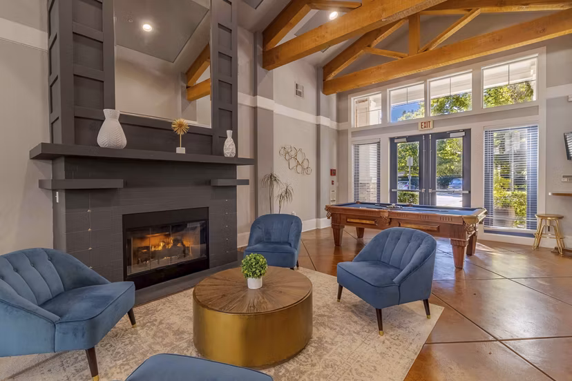 Modern clubhouse with open seating and stylish decor at Morgan Park Apartments