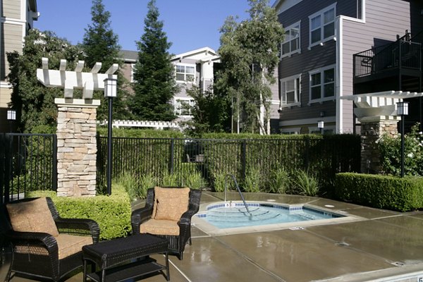 Recreational area with lush landscaping and modern seating at Morgan Park Apartments