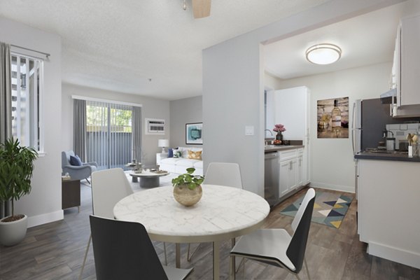 Dining area with elegant wooden furnishings at Autumn Springs Apartments