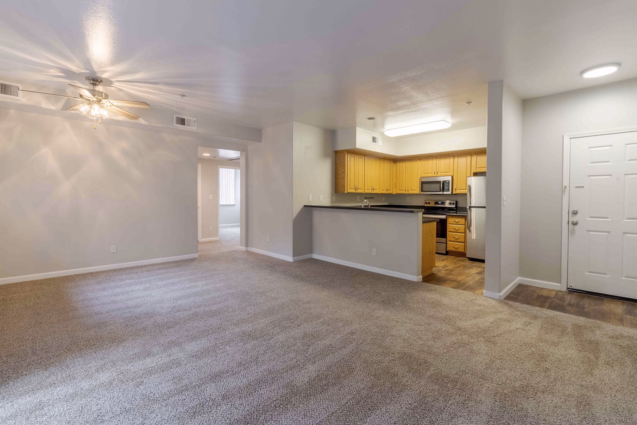 Spacious living room with modern decor at Park Place Apartments
