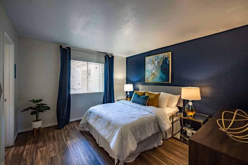The Bella Apartments: Modern bedroom with sleek design and natural light in luxury apartments