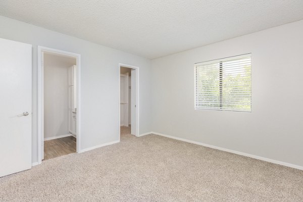 bedroom at The Bella Apartments