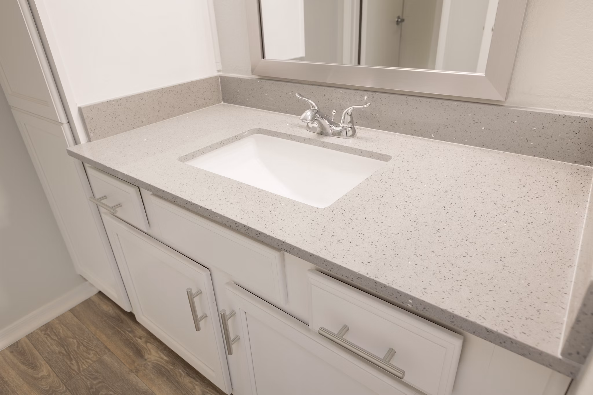 The Bella Apartments: Elegant bathroom with modern fixtures and sleek design