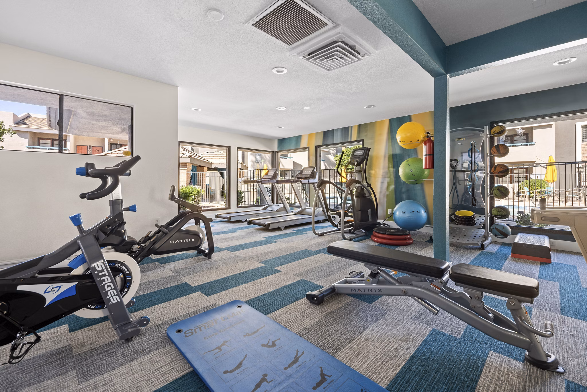 Modern fitness center with top-of-the-line equipment at The Bella Apartments
