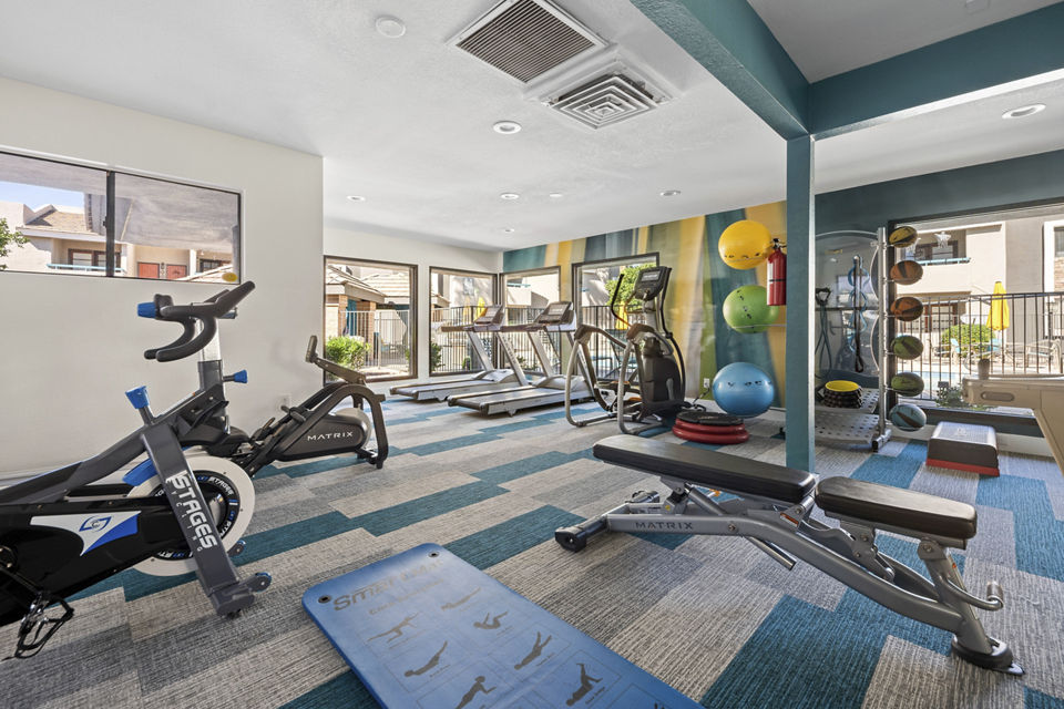 Modern fitness center with top-of-the-line equipment at The Bella Apartments
