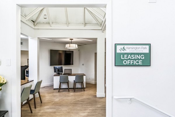 Kensington Apartments: Modern clubhouse and leasing office featuring stylish decor and open layout