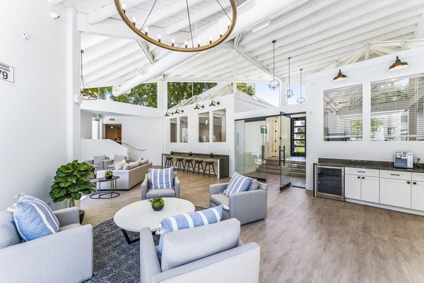 Kensington Apartments: Stylish clubhouse featuring modern decor and seating areas
