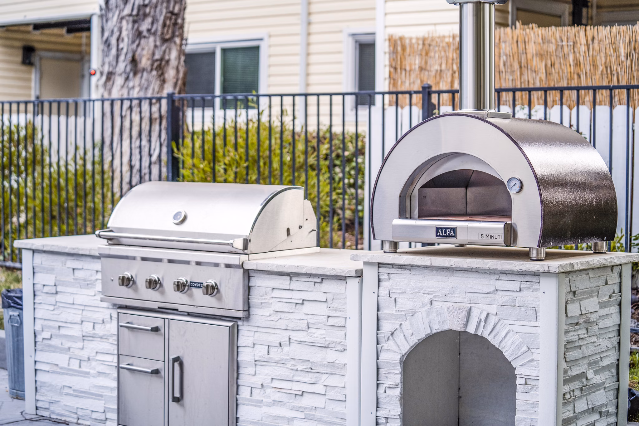 Spacious grill area on patio at Kensington Apartments offering an outdoor cooking experience for residents
