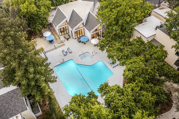 Luxury pool at Kensington Apartments offering serene relaxation space in vibrant urban setting