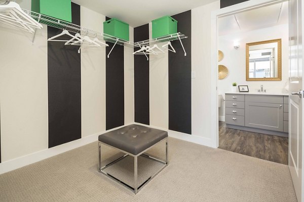 Spacious bedroom with modern furnishings at Highlands 32 Apartments
