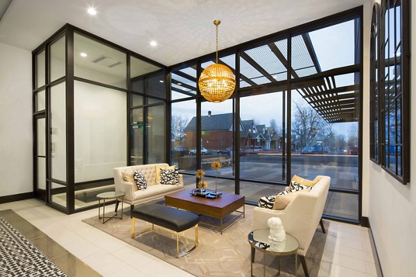 Modern clubhouse with lounge and dining areas at Highlands 32 Apartments for luxury living