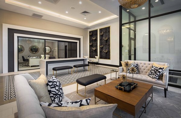 Modern clubhouse with cozy seating and entertainment area at Highlands 32 Apartments, perfect for social gatherings and events
