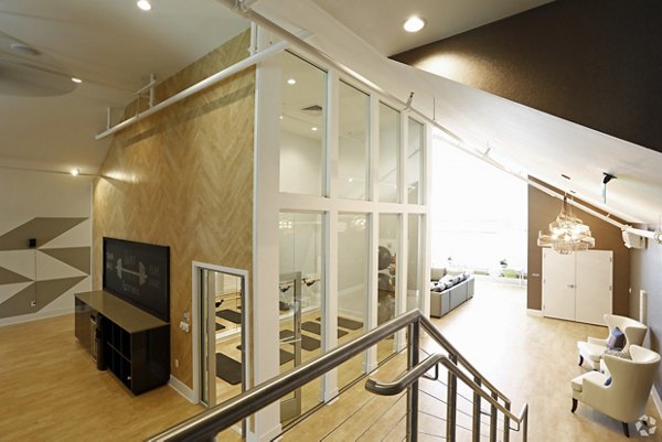 Bright hallway with modern lighting at Highlands 32 Apartments in downtown Denver