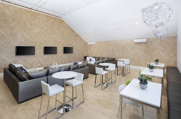 Modern clubhouse with elegant furnishings at Highlands 32 Apartments