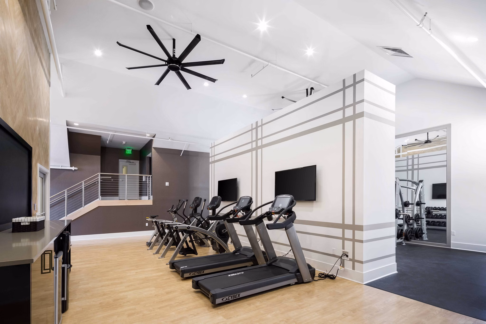 State-of-the-art fitness center at Highlands 32 Apartments offering top-tier workout equipment and facilities for residents