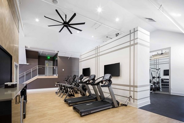 State-of-the-art fitness center at Highlands 32 Apartments offering top-tier workout equipment and facilities for residents
