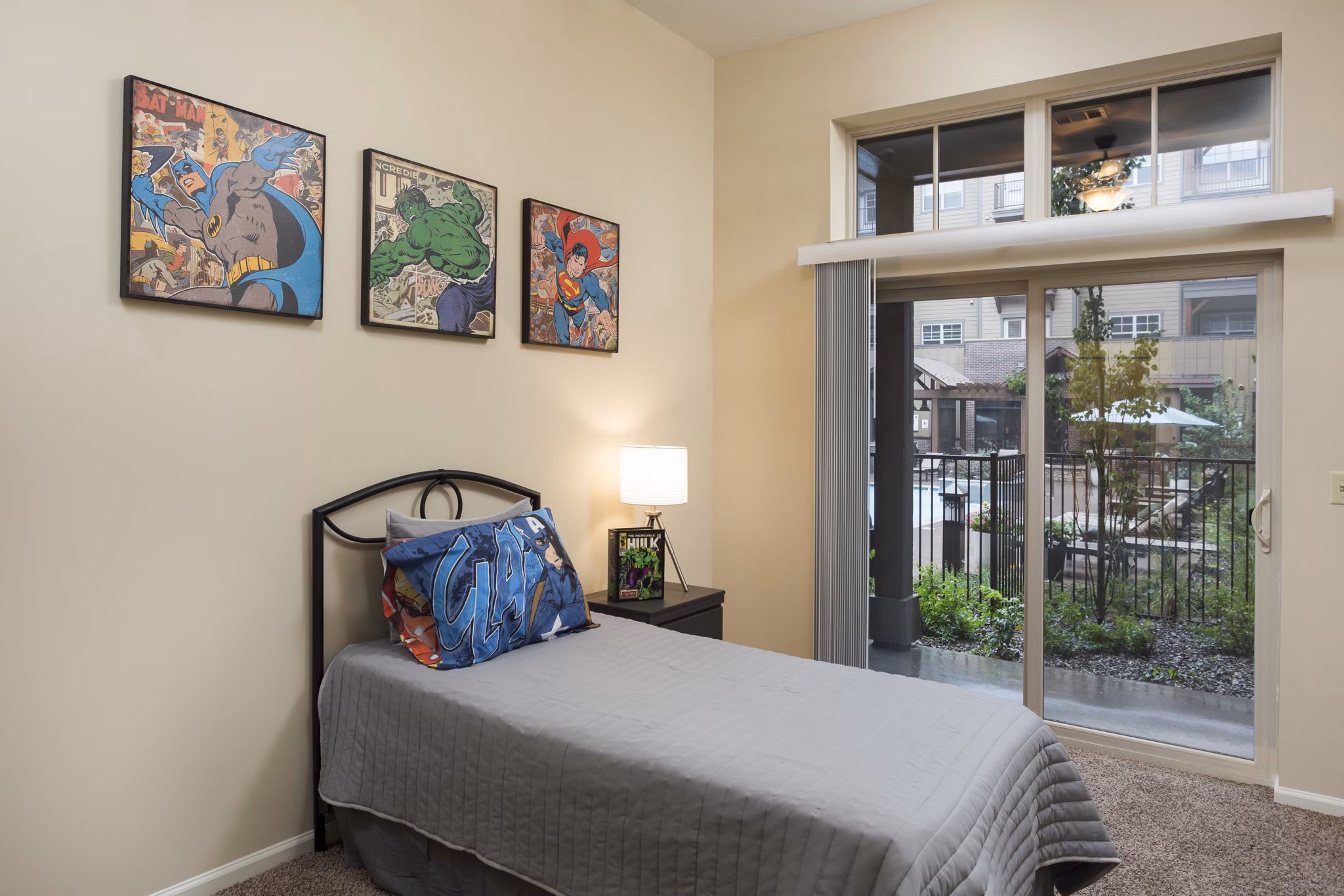 Comfortable bedroom with modern furnishings at Village at Aspen Place Apartments