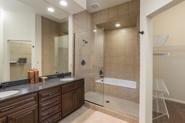 Modern bathroom with sleek fixtures in Village at Aspen Place luxury apartments
