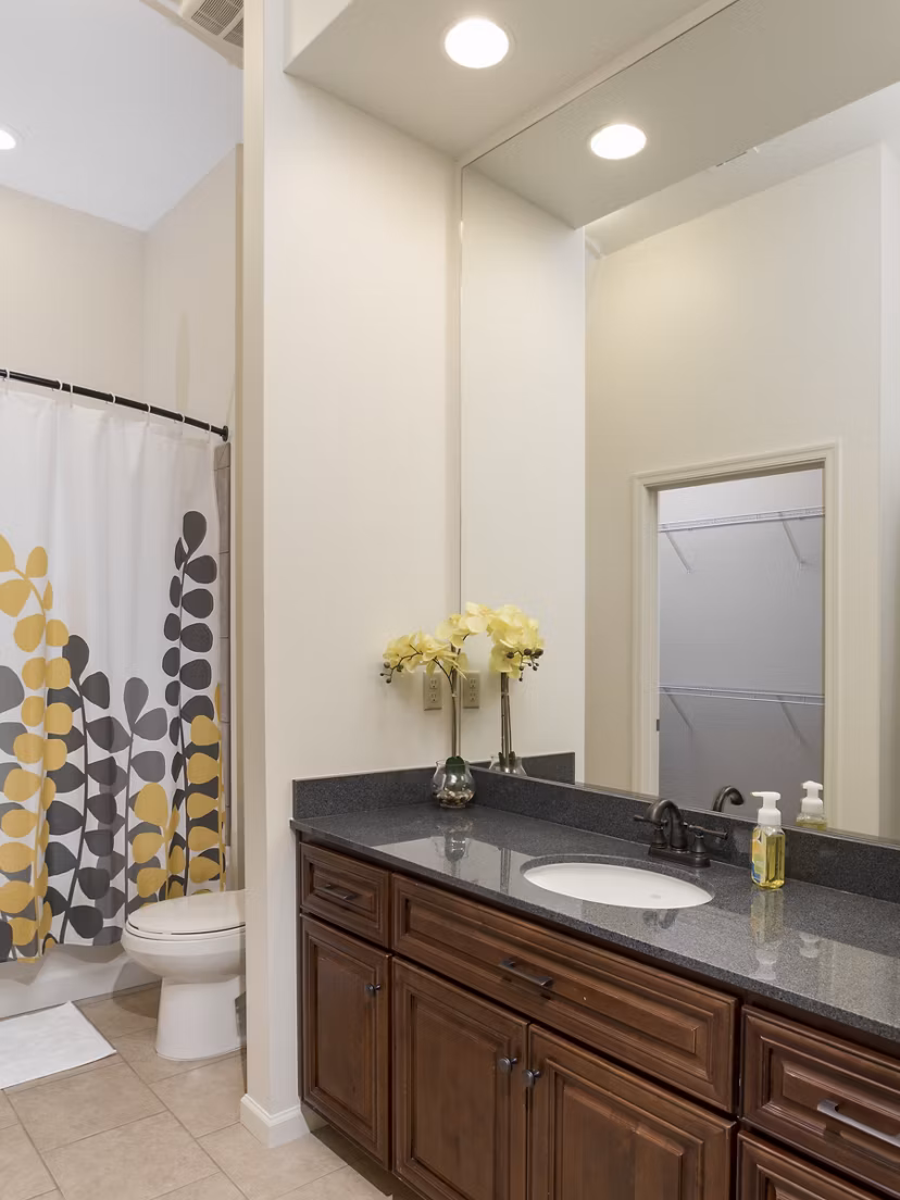 Bathroom featuring modern fixtures at Village at Aspen Place Apartments
