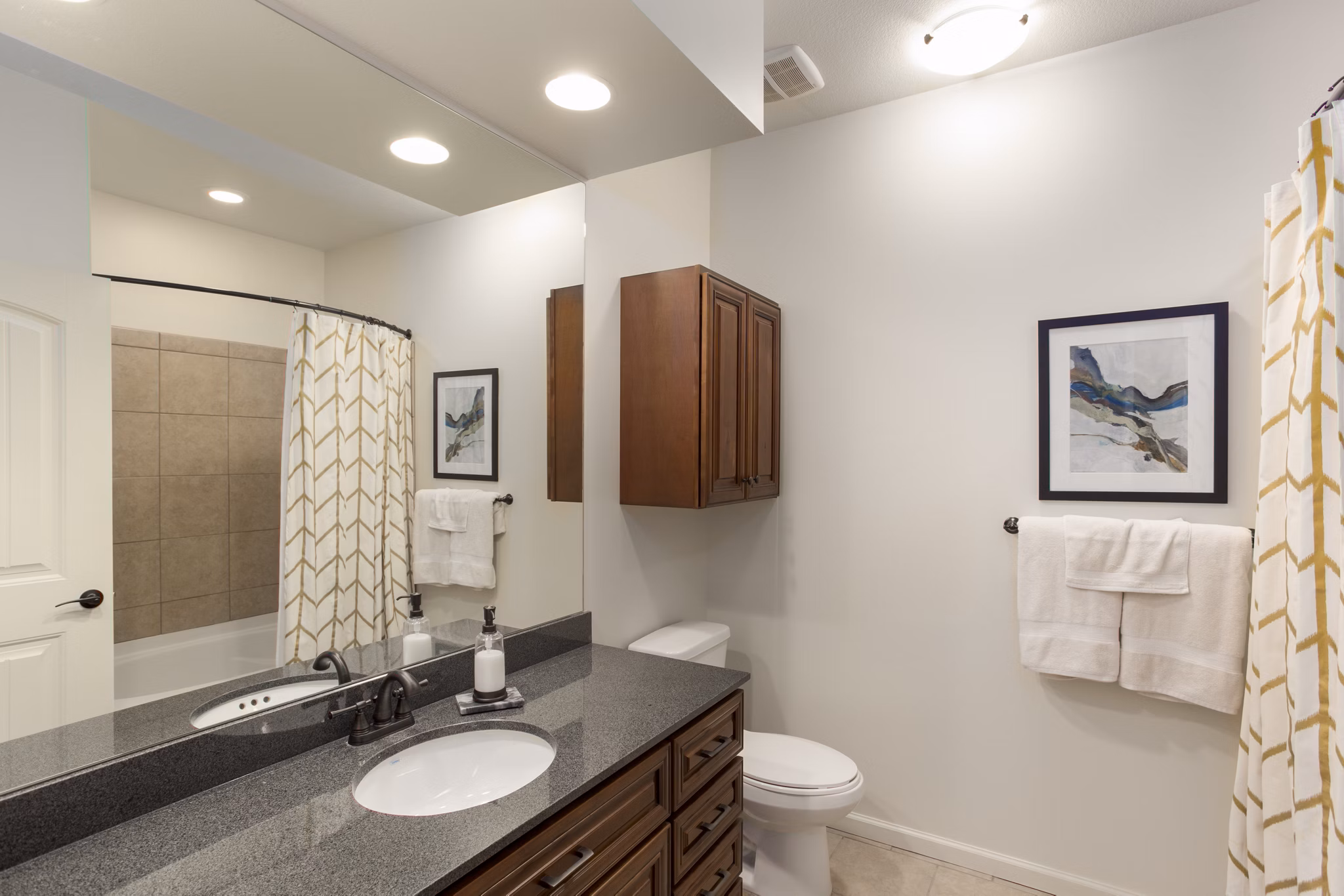 Bathroom featuring modern design and sleek fixtures at Village at Aspen Place Apartments