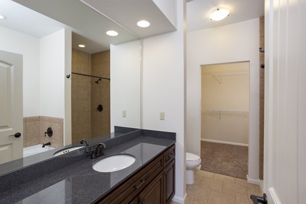 Bathroom with modern fixtures and sleek design at Village at Aspen Place Apartments