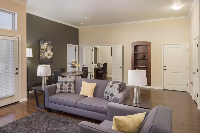 Spacious living room with modern decor at Village at Aspen Place Apartments