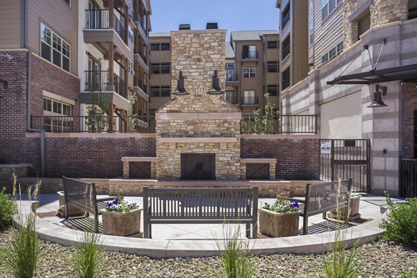 Cozy outdoor fire pit area at Village at Aspen Place Apartments