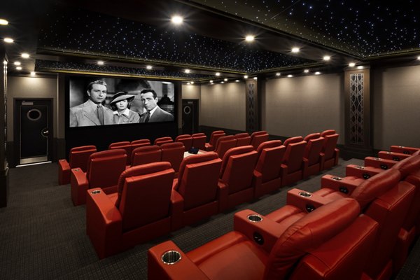 Luxurious movie theatre in Talaria Apartments offering a premium cinematic experience for residents