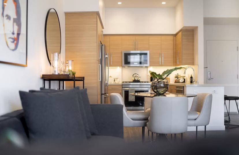 Modern kitchen featuring stainless steel appliances at Talaria Apartments, luxury living in a Greystar community