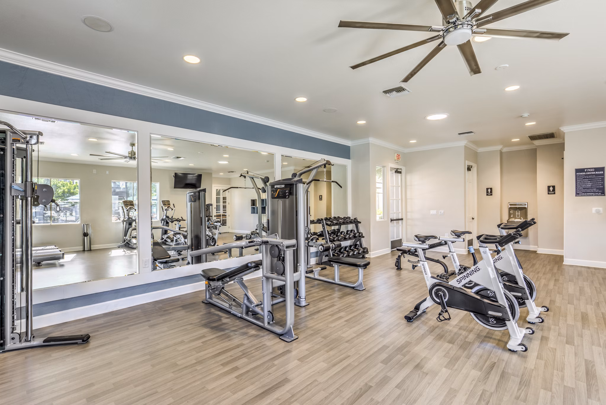 Fitness center with modern equipment at The Paseo at Town Center apartments, perfect for maintaining a healthy lifestyle