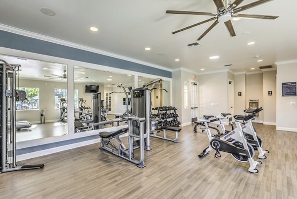 Fitness center with modern equipment at The Paseo at Town Center apartments, perfect for maintaining a healthy lifestyle