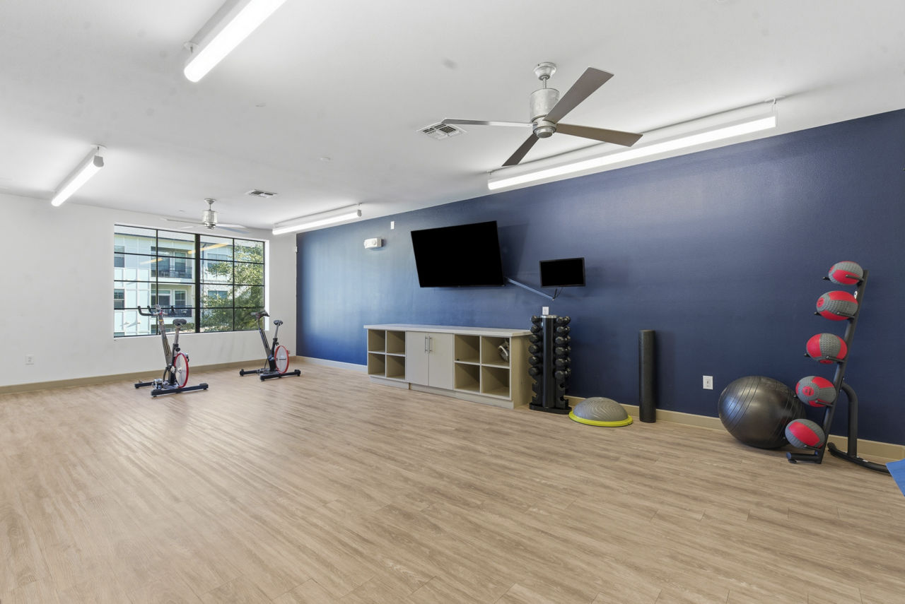Gym at The Sterling At Oak Hills (1 of 2)
